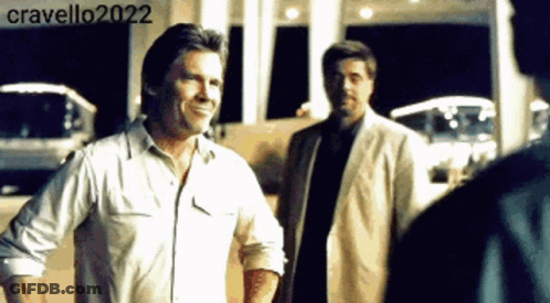 Two Men Standing In Front Of Building Cravello2022 GIF