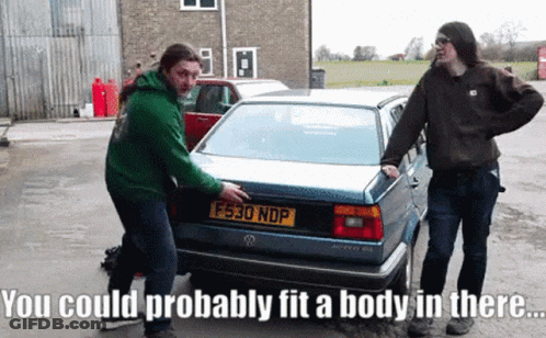 Two Men Standing In Front Of Car With License Plate F530 NDP GIF