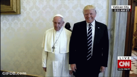 Two Men Standing In Front Of CNN Live Wall GIF