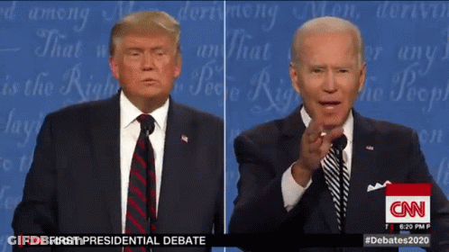 Two Men Standing In Front Of CNN Screen GIF