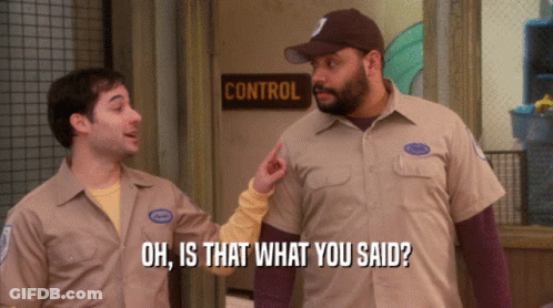 Two Men Standing In Front Of Control Door GIF