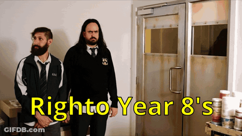Two Men Standing In Front Of Door With Right To Year 8'S GIF