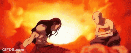 Two Men Standing In Front Of Fireball GIF