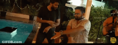 Two Men Standing In Front Of Swimming Pool Anchor Ravi GIF