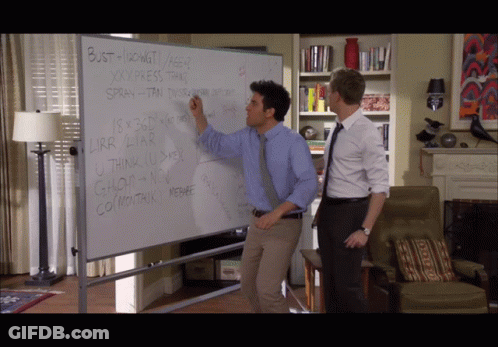 Two Men Standing In Front Of Whiteboard Saying Bust Hardwatt GIF