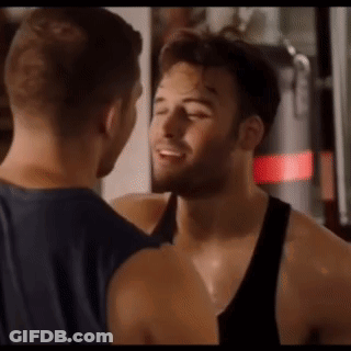 Two Men Standing In Gym GIF