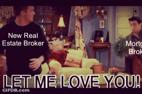 Two Men Standing In Living Room With Let Me Love You GIF