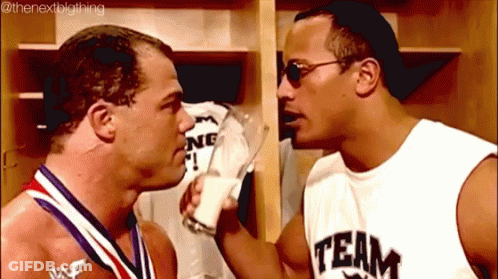 Two Men Standing In Locker Room GIF