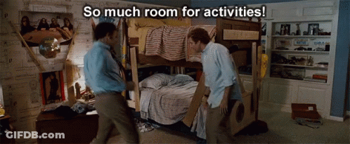 Two Men Standing Next To A Bunk Bed With The Words So Much Room For Activities Above Them GIF