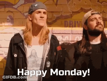 Two Men Standing Next To Brick Wall GIF