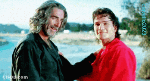 Two Men Standing Next To Each Other 2023 GIF