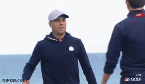 Two Men Standing Next To Each Other GIF