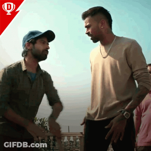 Two Men Standing Next To Each Other GIF