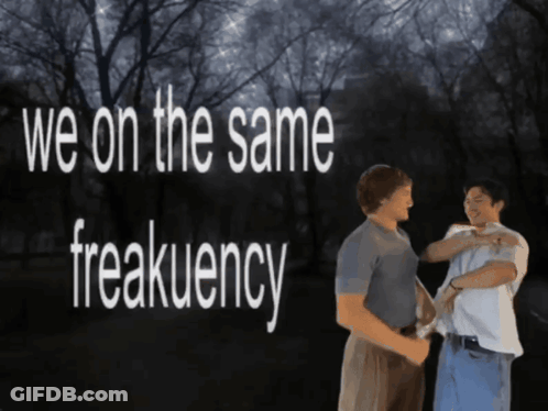 Two Men Standing Next To Each Other GIF