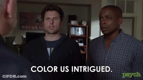 Two Men Standing Next To Each Other Color Us Intrigued GIF