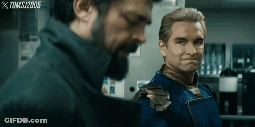 Two Men Standing Next To Each Other GIF
