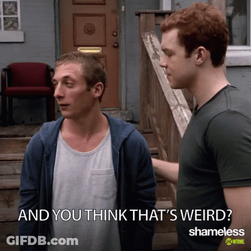 Two Men Standing Next To Each Other GIF