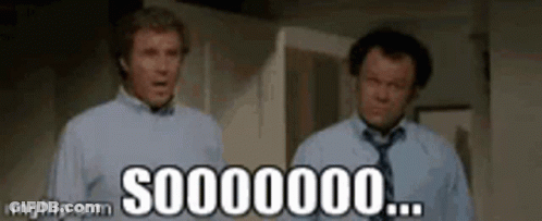 Two Men Standing Next To Each Other GIF