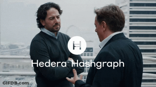 Two Men Standing Next To Each Other Hedera Hashgraph GIF