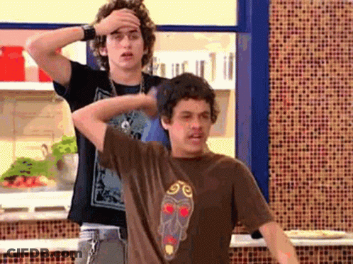 Two Men Standing Next To Each Other GIF
