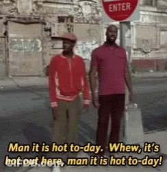 Two Men Standing Next To Each Other In Front Of A Stop Sign That Says Enter GIF