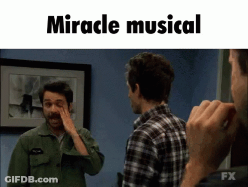 Two Men Standing Next To Each Other Miracle Musical GIF