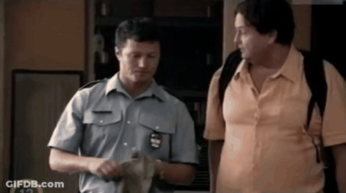 Two Men Standing Next To Each Other Number 12 GIF