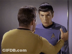 Two Men Standing Next To Each Other One Wearing Star Trek Shirt GIF