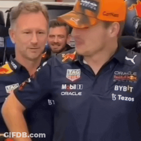 Two Men Standing Next To Each Other One With Hat GIF
