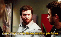 Two Men Standing Next To Each Other Saying How They Made Those Motion Pictures GIF