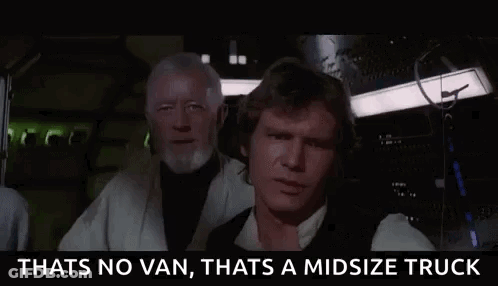 Two Men Standing Next To Each Other Saying That's No Van That's A Midsize Truck GIF