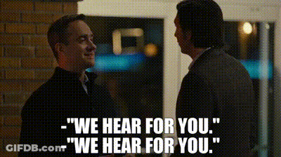 Two Men Standing Next To Each Other Saying We Hear For You GIF