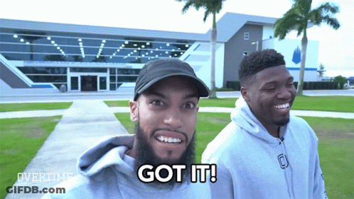 Two Men Standing Next To Each Other GIF
