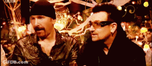 Two Men Standing Next To Each Other With A Bbc Logo On The Bottom Right GIF