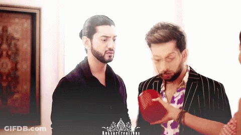 Two Men Standing Next To Each Other With A Watermark That Says ' Ruban Creations ' On The Bottom GIF