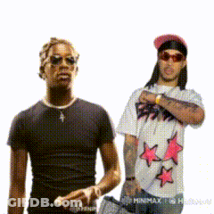 Two Men Standing Next To Each Other With One Wearing A Shirt That Says ' Minimal ' On It GIF