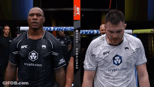 Two Men Standing Next To Each Other With One Wearing A Shirt That Says Ufc GIF