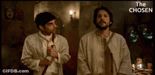 Two Men Standing Next To Each Other With The Chosen GIF