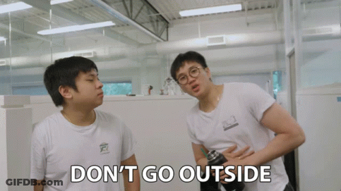 Two Men Standing Next To Each Other With The Words " Do N't Go Outside " Written On The Bottom GIF