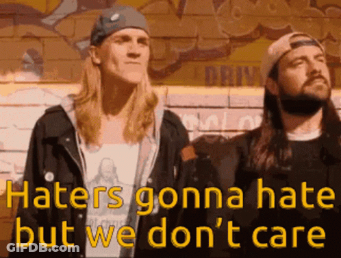 Two Men Standing Next To Each Other With The Words Haters Gonna Hate But We Don 'T Care On The Bottom GIF