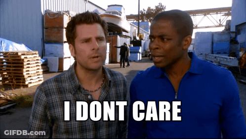 Two Men Standing Next To Each Other With The Words " I Dont Care " On The Bottom Right GIF