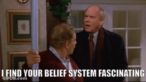 Two Men Standing Next To Each Other With The Words " I Find Your Belief System Fascinating " Below Them GIF
