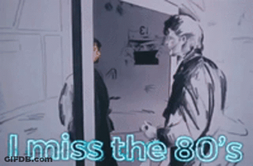 Two Men Standing Next To Each Other With The Words " I Miss The 80 'S " On The Bottom GIF