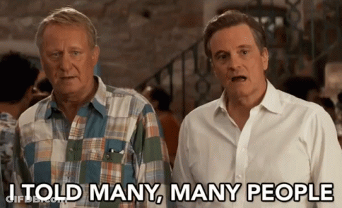 Two Men Standing Next To Each Other With The Words I Told Many Many People GIF