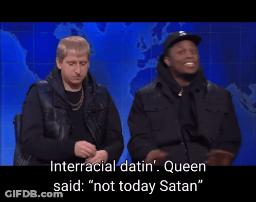 Two Men Standing Next To Each Other With The Words " Interracial Datin ' Queen Said " On The Bottom GIF