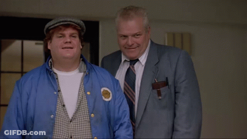 Two Men Standing Next To Each Other With The Words Schnikes Written On The Bottom GIF