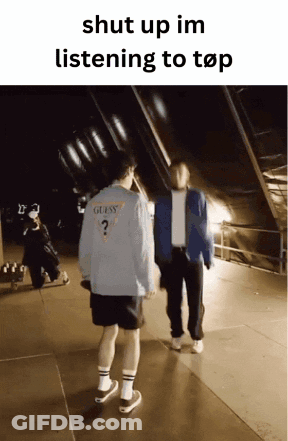 Two Men Standing Next To Each Other With The Words Shut Up Im Listening To Top At The Top GIF