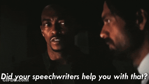 Two Men Standing Next To Each Other With Ending Text GIF