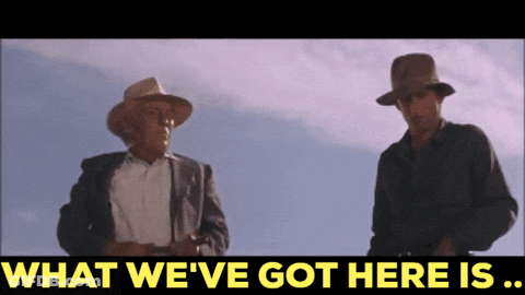 Two Men Standing Next To Each Other With The Words " What We 'Ve Got Here Is " GIF
