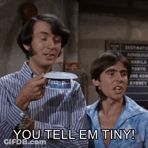 Two Men Standing Next To Each Other With The Words You Tell Em Tiny On The Bottom Right GIF